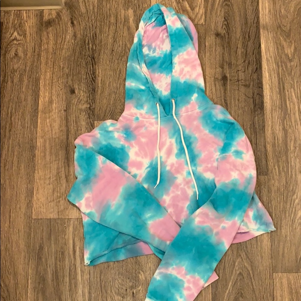 Cropped tie dye pink, blue, and white sweatshirt.